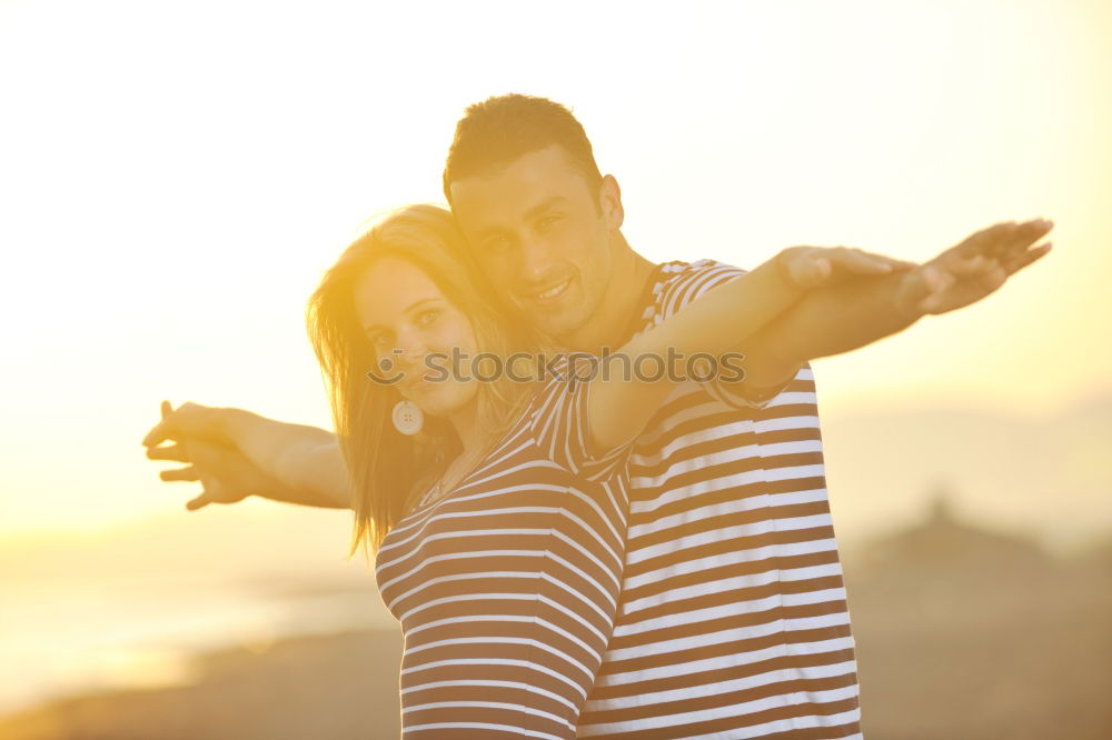 Image, Stock Photo Unrecognizable hugging couple in sunny street