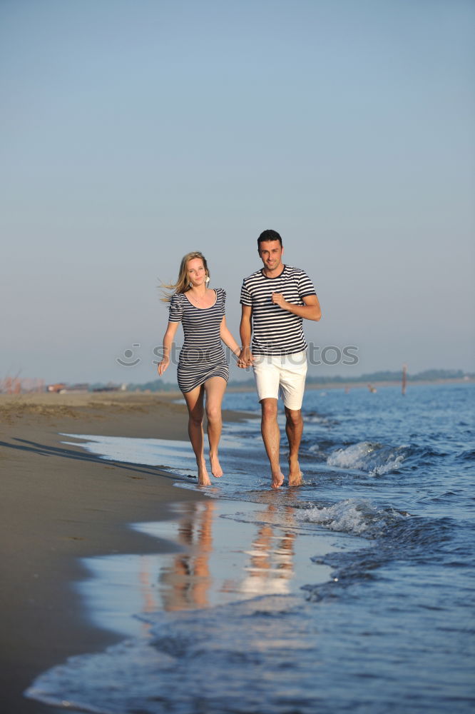 Similar – Image, Stock Photo Father and son playing on the beach at the day time.