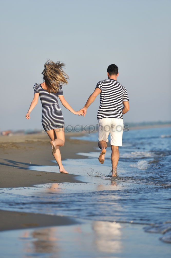 Similar – Image, Stock Photo Happy children playing on the beach at the day time.