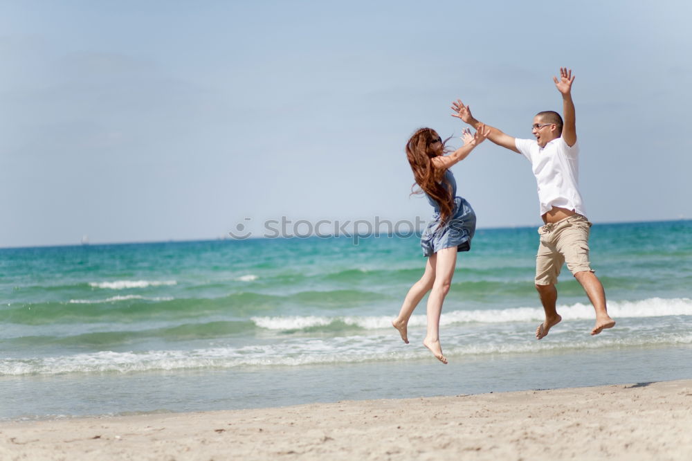 Similar – Happy family walking on the beach at the day time.