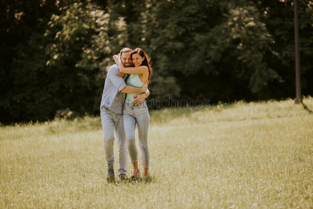 Similar – Image, Stock Photo Heavily pregnant woman laughs and rejoices with her husband