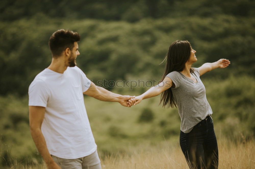 Similar – Image, Stock Photo Cool couple dancing on a road