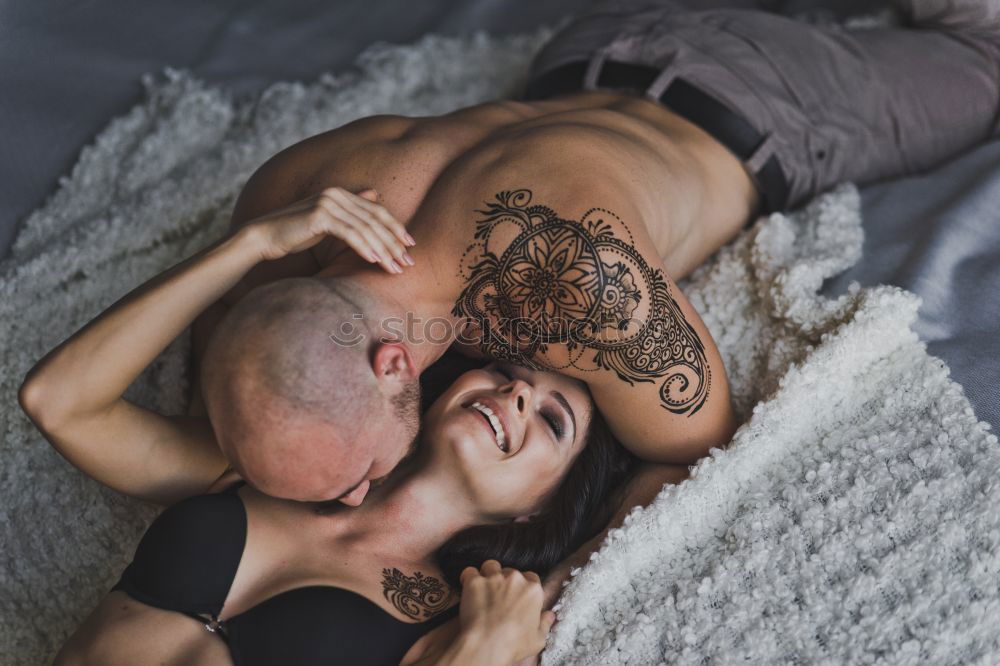 Similar – Image, Stock Photo Couple embracing in car