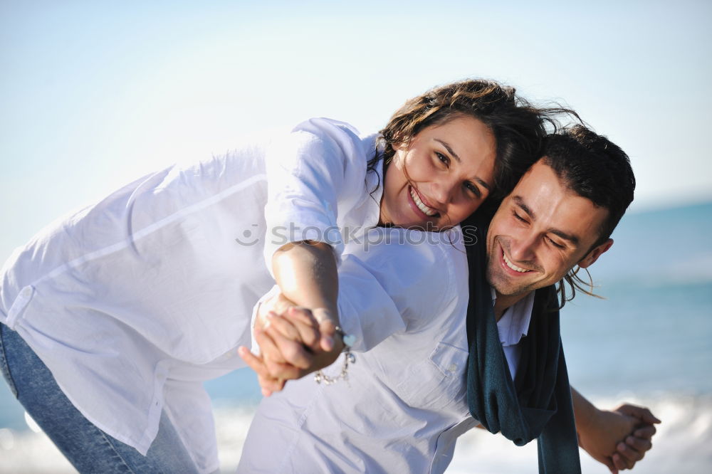 Similar – Happy father and son playing on the beach