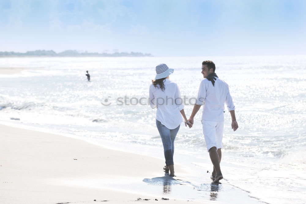 Similar – Image, Stock Photo Romantic bride and groom strolling on beach