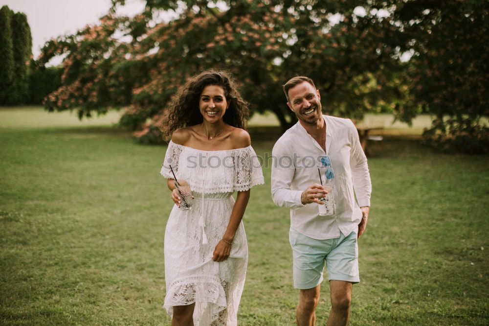 Mixed race couple on the beach, honeymoon