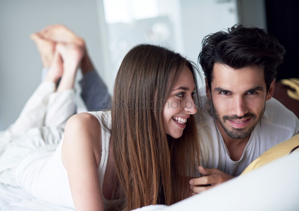 Similar – Image, Stock Photo Mixed Race couple taking funny selfie with phone together