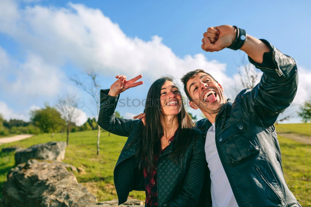 Similar – Image, Stock Photo Happy young adult couple with cute puppy