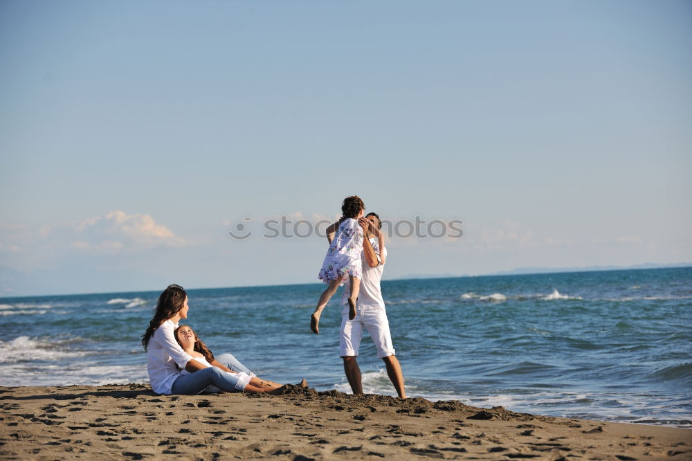 Similar – Image, Stock Photo Two adults training on the beach together