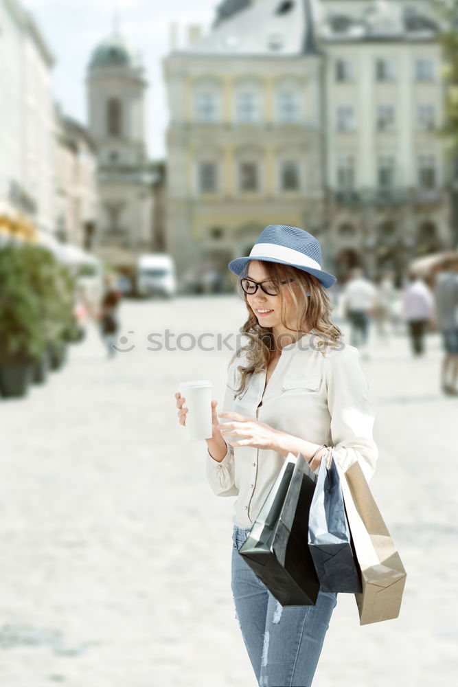 Similar – Image, Stock Photo Portrait of a Young woman using her mobile phone.