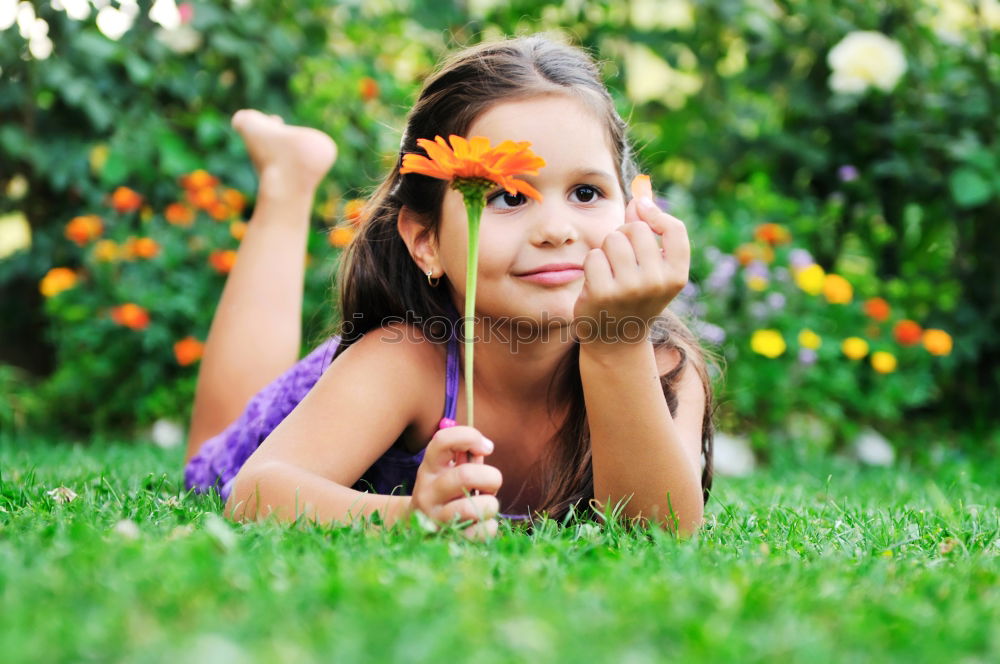 Similar – Three happy children playing in the park at the day time.