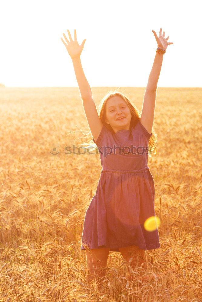 Image, Stock Photo Young woman with yellow dress and hat walks in the countryside.