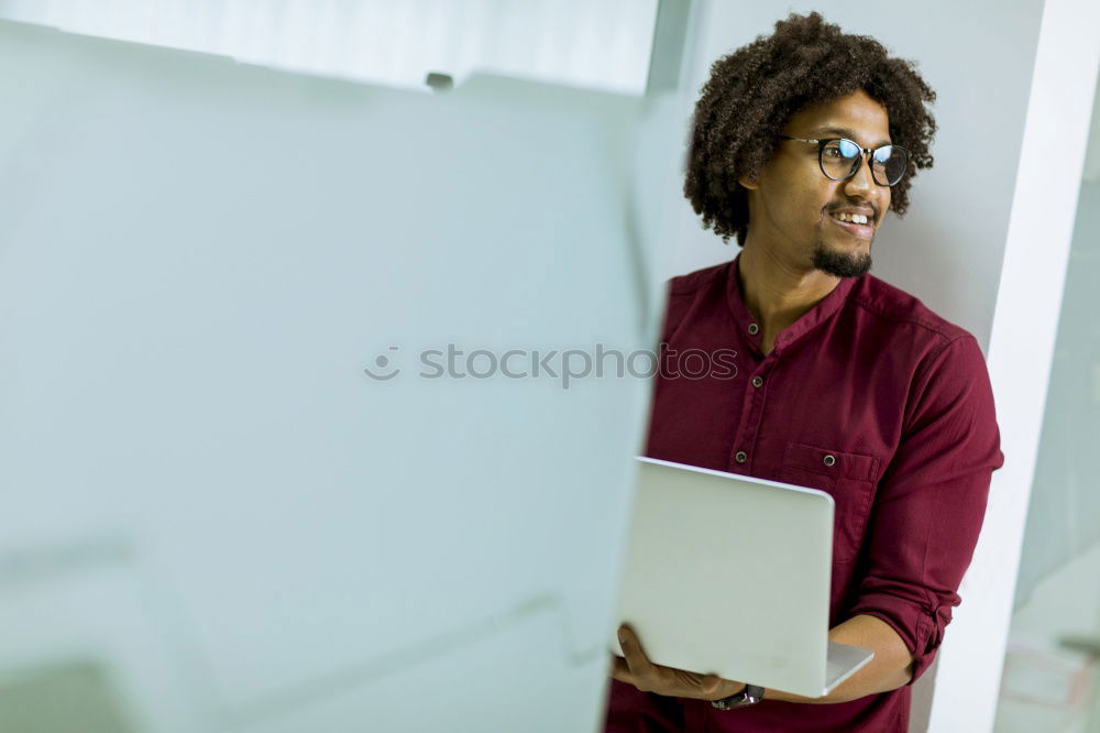 Similar – Image, Stock Photo Portrait of a young thoughtful mixed race man sitting in the sofa