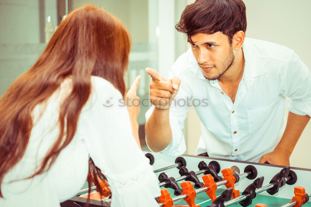 Similar – Girl and boy playing chess at home