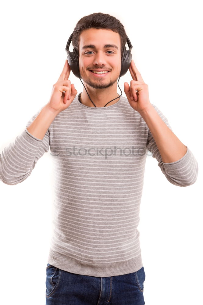 Similar – Black serious man listening to music in headphones