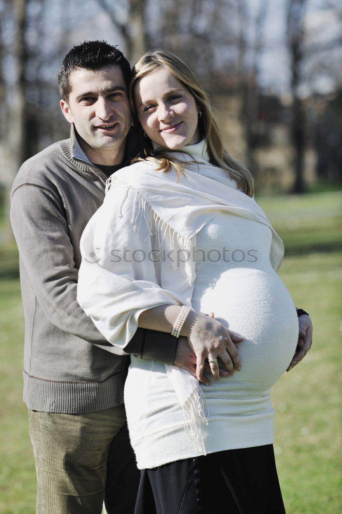 Similar – Image, Stock Photo Young couple pregnant in forest
