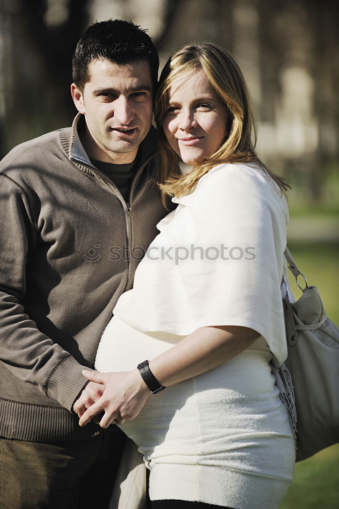 Similar – Image, Stock Photo Young couple pregnant in forest