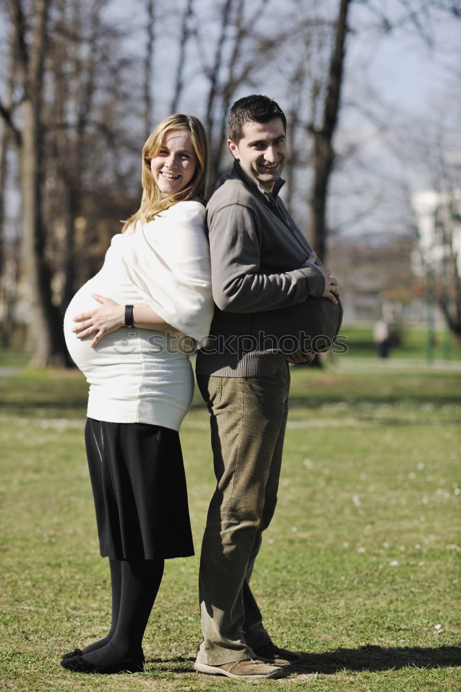 Similar – Image, Stock Photo Young smiling couple on a path in the park.