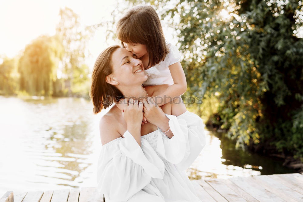 Similar – Image, Stock Photo Mother with child in park