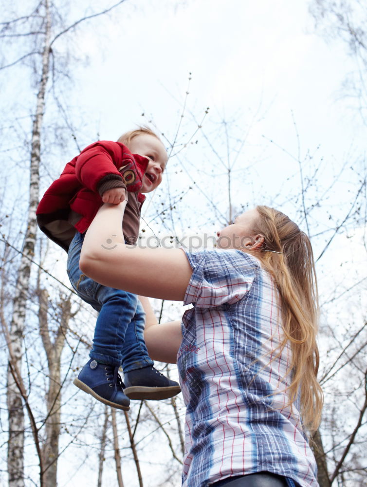 Similar – Image, Stock Photo Happy mother and son having fun on beach on vacation