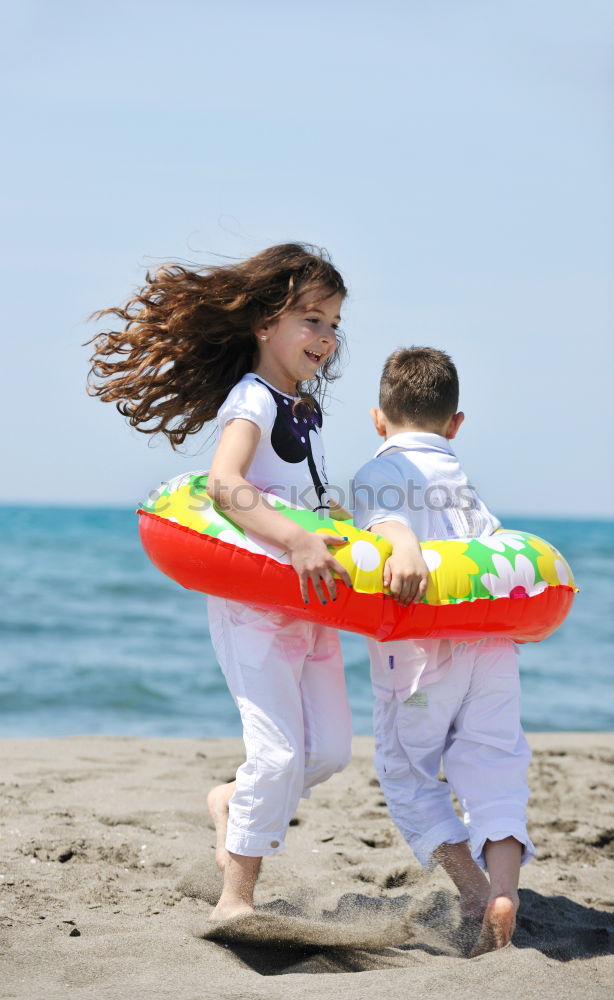 Similar – Image, Stock Photo Little boy with rubber ring