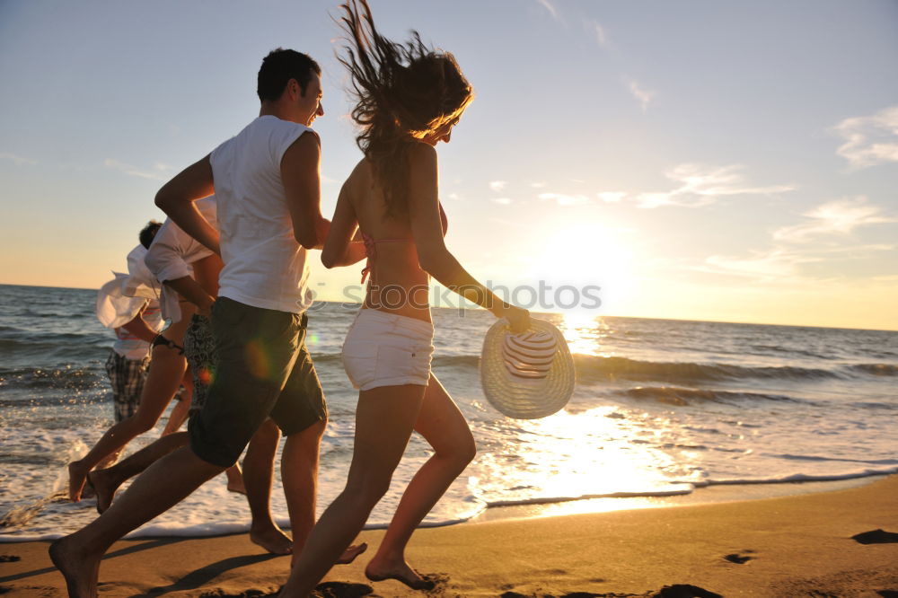 Similar – Father and son playing on the beach at the day time.