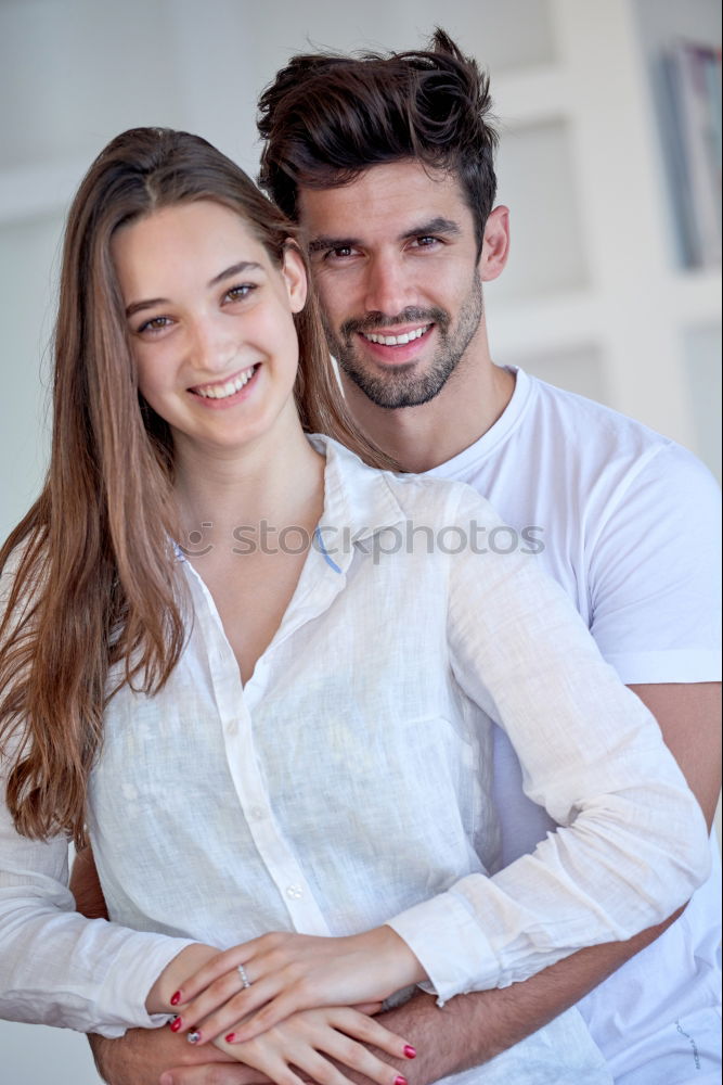 Similar – Young beautiful couple posing wearing jeans and t-shirt