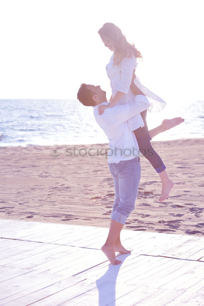 Similar – Image, Stock Photo Father and son playing on the beach at the sunset time.