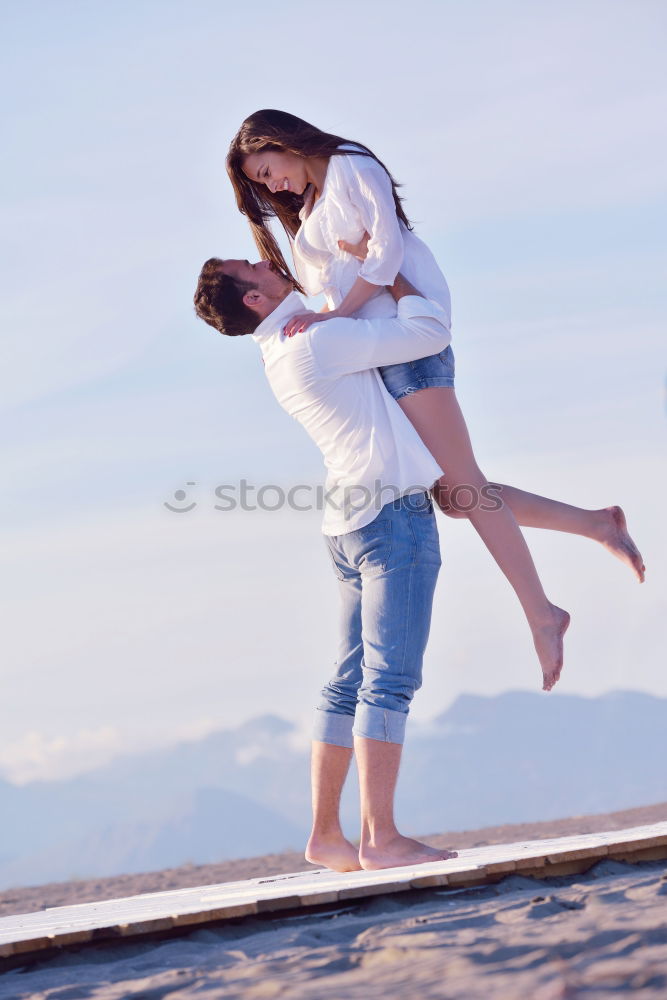 Similar – Image, Stock Photo Fitness couple kissing on the beach