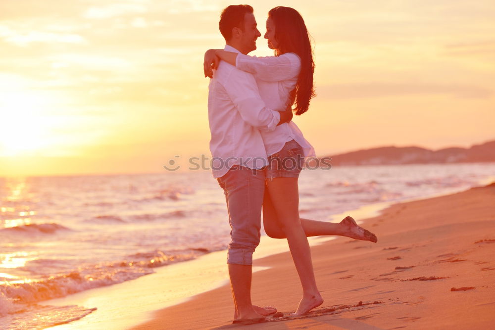 Similar – Father and son playing on the beach at the sunset time. Concept of friendly family.