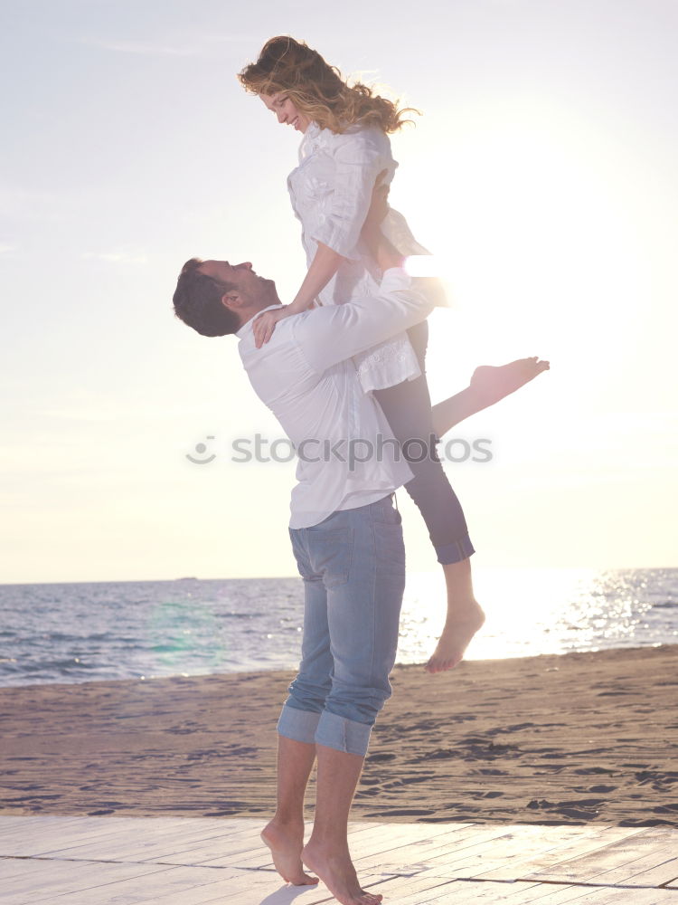 Similar – Happy father and son playing on the beach