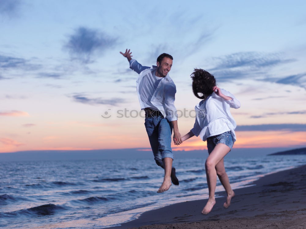 Similar – Father and son playing on the beach at the day time.