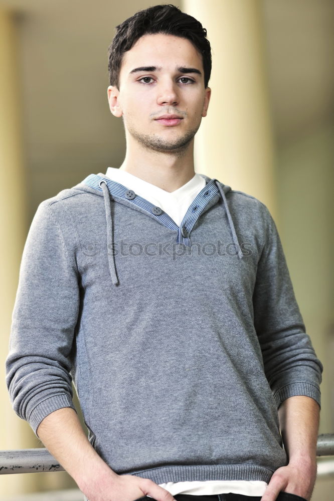 Similar – Image, Stock Photo Young man in sportswear leaning on metal fence and posing on sta