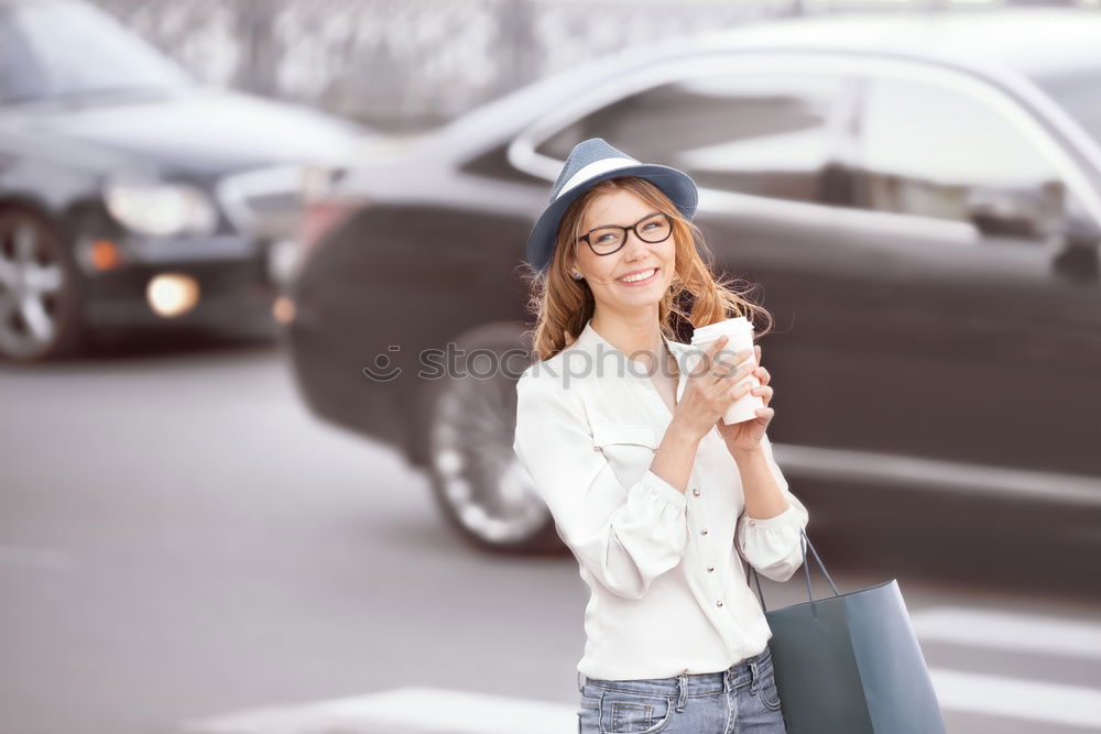 Similar – Attractive blond woman checking her mobile phone