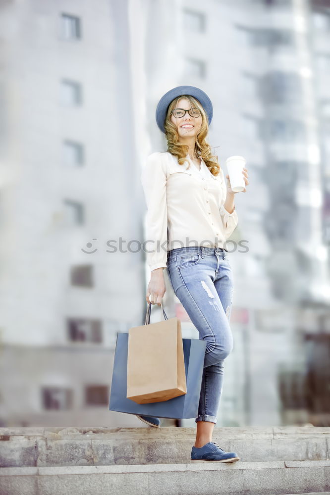 Similar – Image, Stock Photo Portrait of a Young woman using her mobile phone.