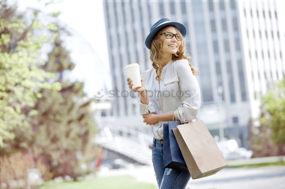 Similar – Image, Stock Photo Content female in trendy wear doing shopping at city street