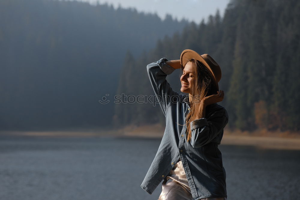 Similar – Image, Stock Photo Smiling woman at lake