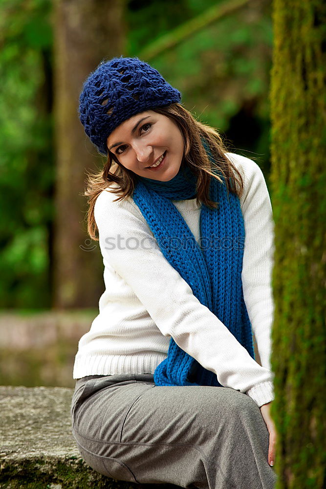 Similar – Woman with cap in cold season