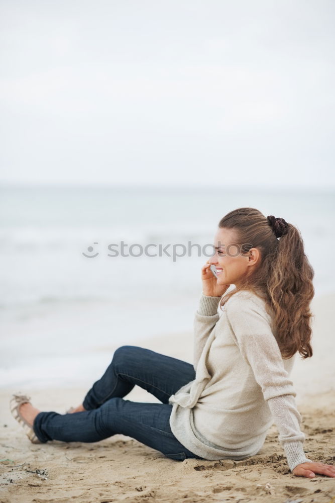 Similar – Brothers sitting at waterfront.Back view