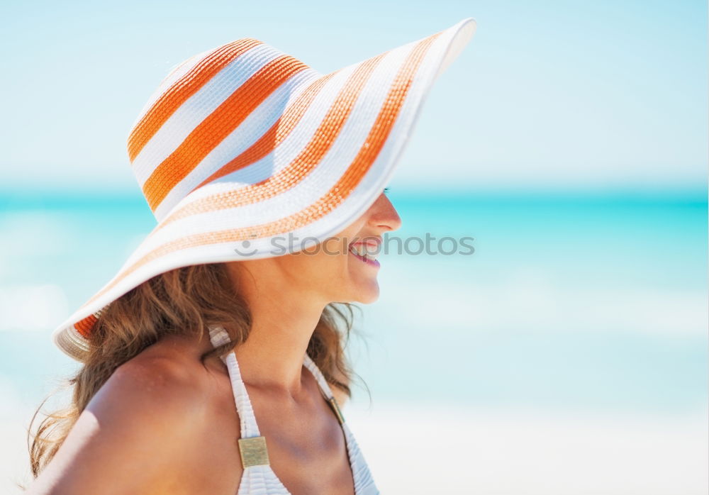 Young Woman Portrait With White Beach Hat