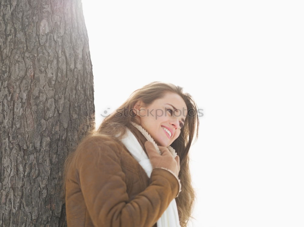 Similar – Woman standing on the street