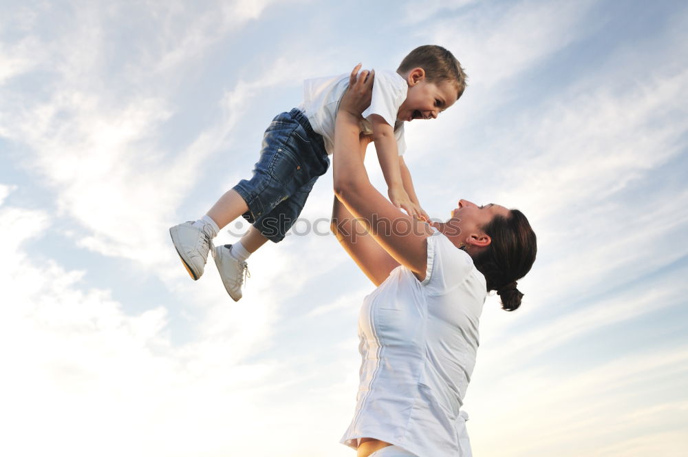 Similar – Father and son playing in the park at the day time.