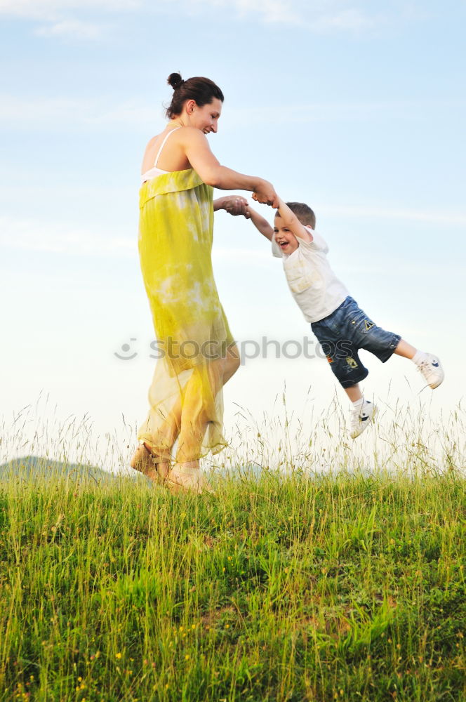 Similar – Father and son playing on the beach at the day time. Concept of friendly family.