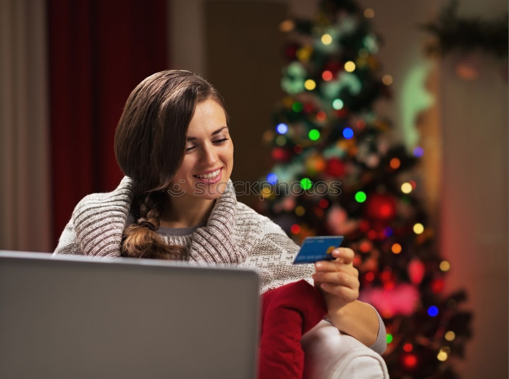 Similar – A happy couple with a child is celebrating Christmas with their friends on video call using webcam. Family greeting their relatives on Christmas eve online. New normal