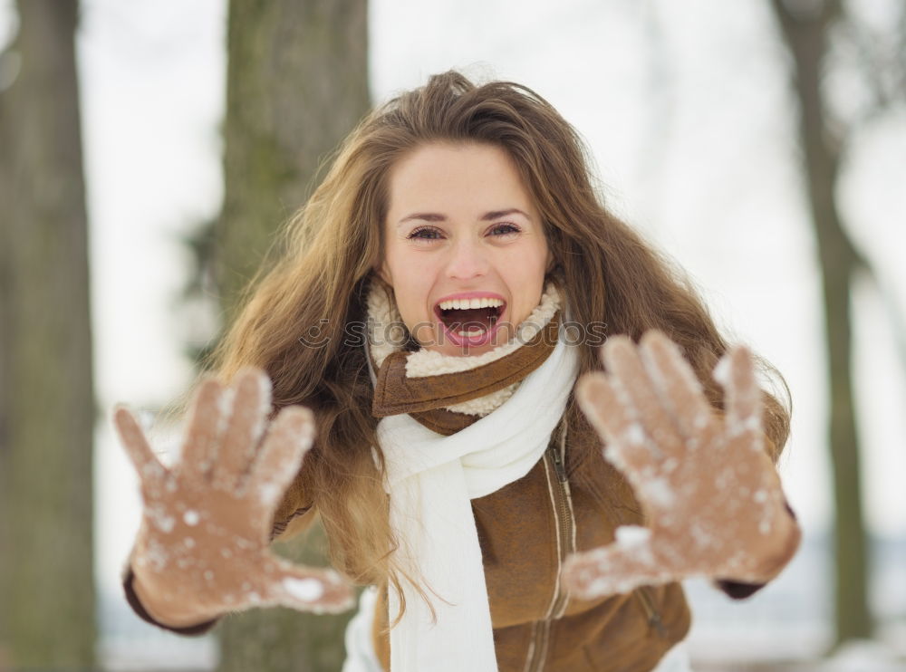 Similar – Image, Stock Photo Portrait of a Young woman using her mobile phone.