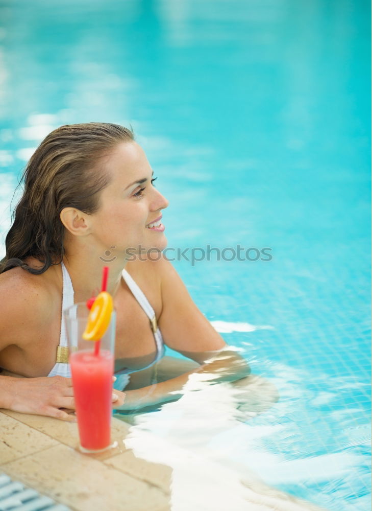 Similar – Two young women in swimsuits relaxing in the swimming pool