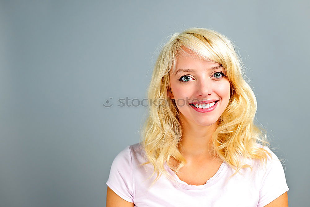 Similar – Side portrait of beautiful freckled blonde woman smiling at camera