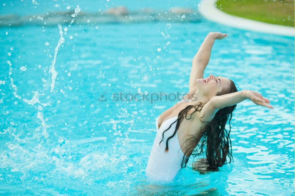 Similar – Girl with dress in pool