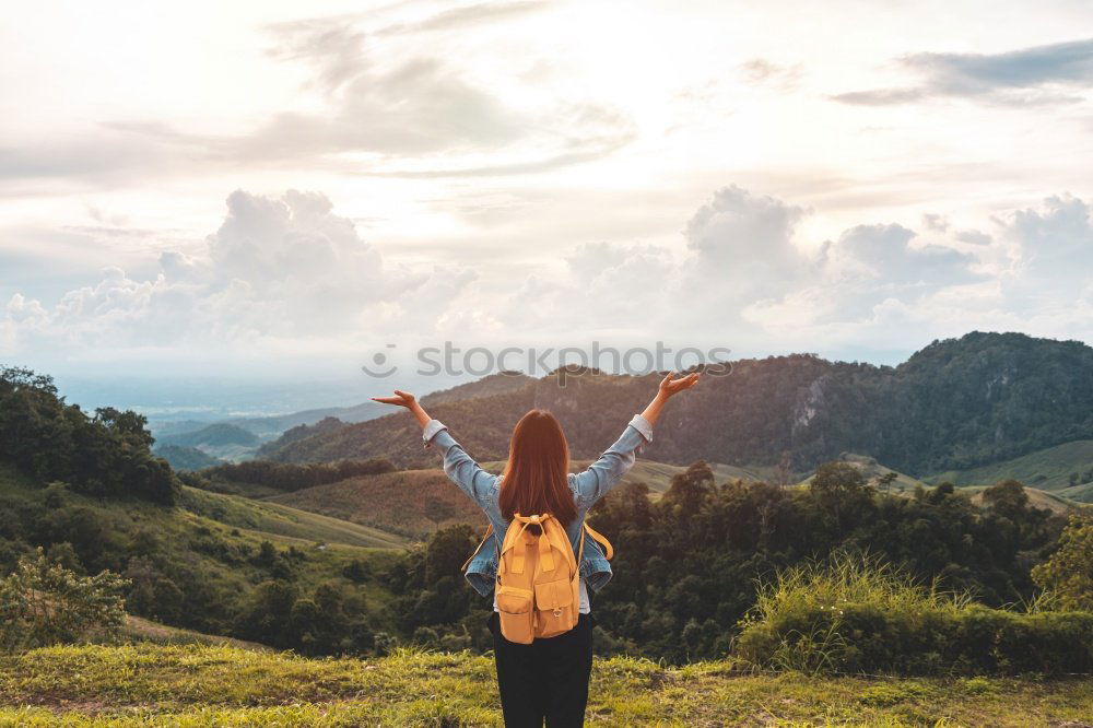 Similar – a man travel alone at the mountain