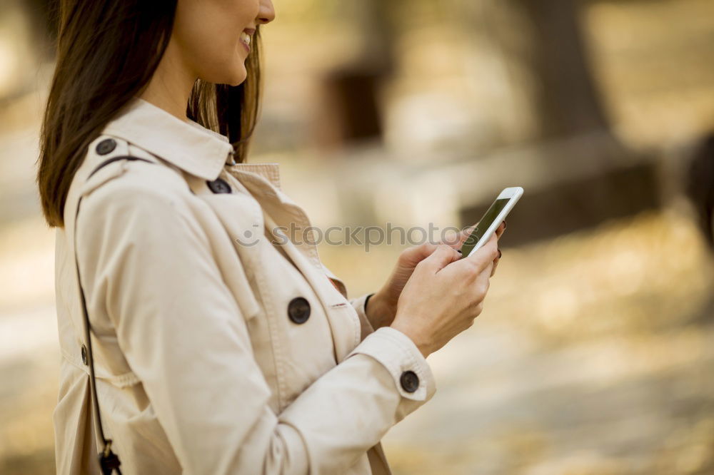 Image, Stock Photo Caucasian happy woman standing in living room using mobil phone